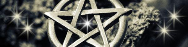 silver pentacle on dark background with a star in the centre and at each side
