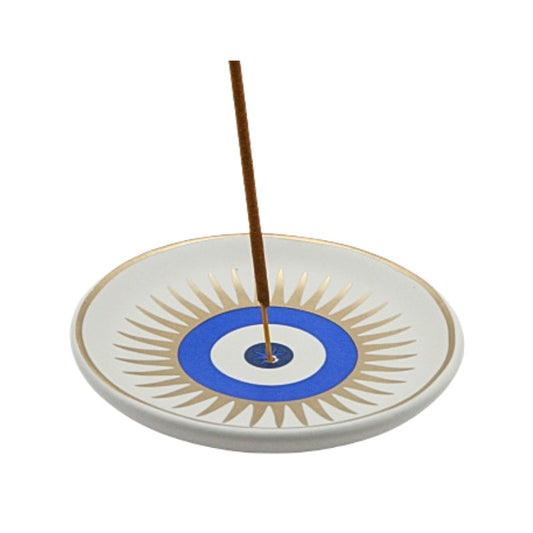 Decorative incense holder with a blue and gold design on a white background