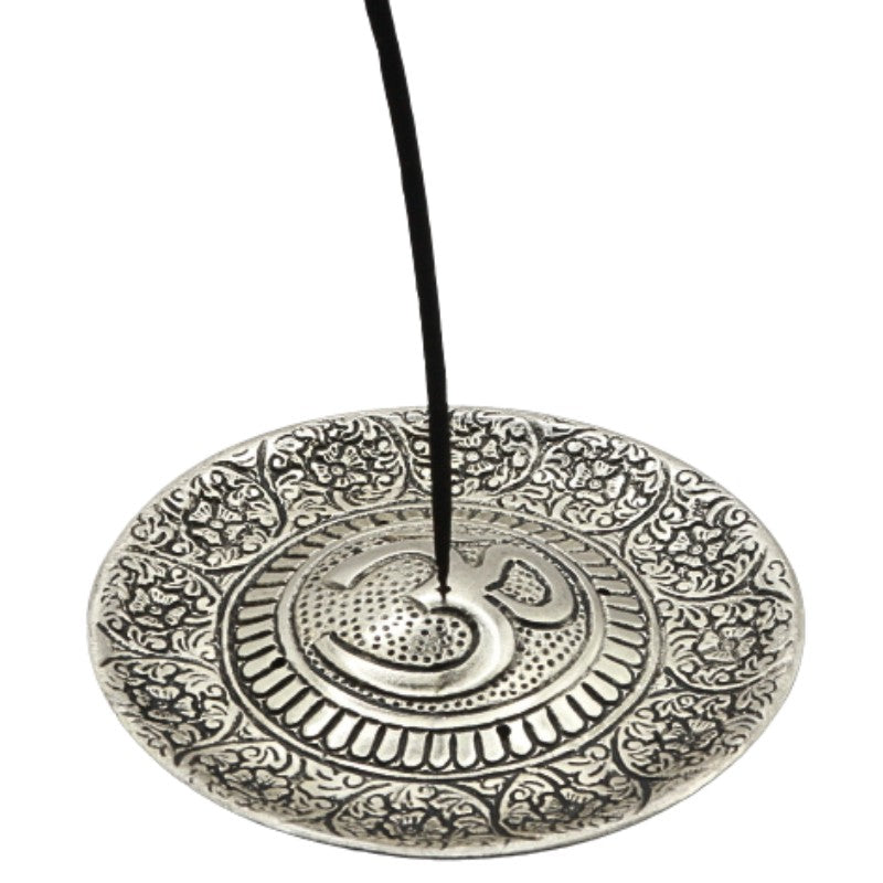 incense stick in an aluminium incense burner