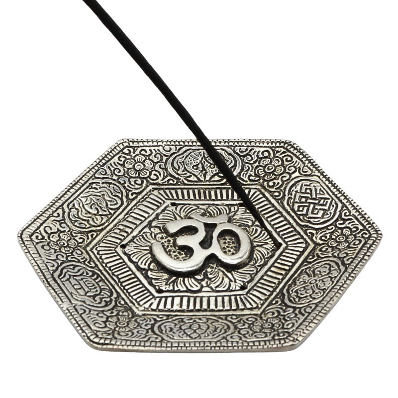 incense stick in an Om symbol hexagonal aluminium incense burner