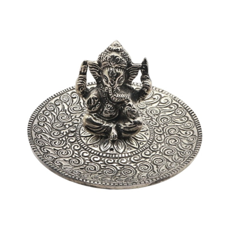 aluminium incense burner with a state of ganesh in the centre