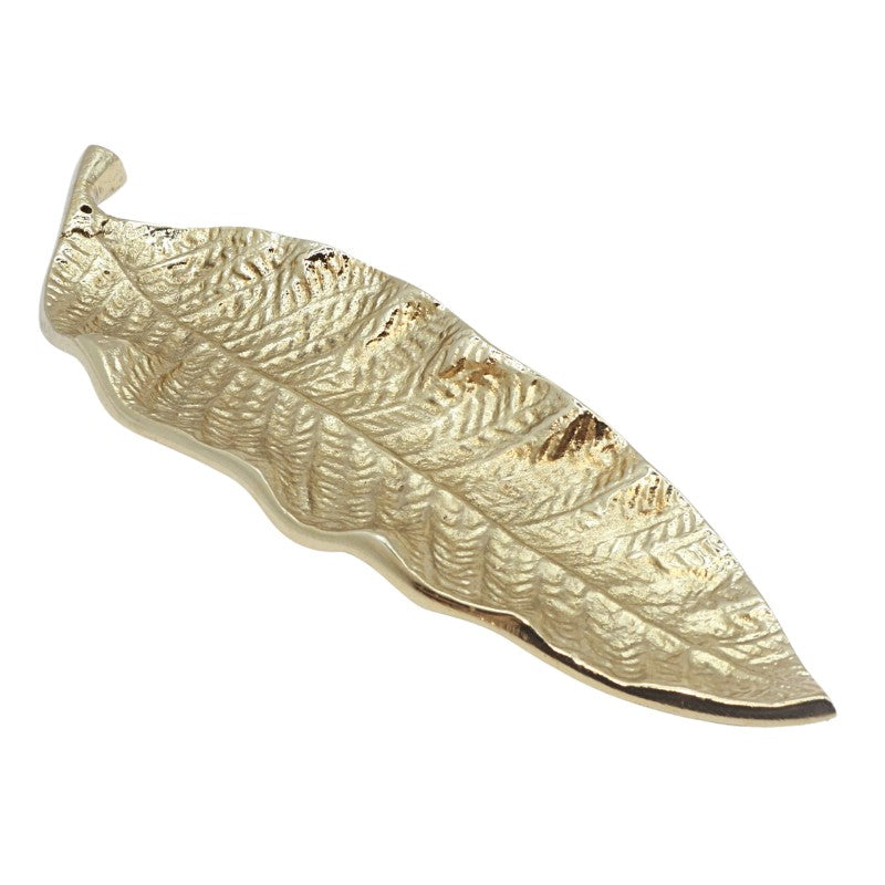 gold incense holder in the shape of a leaf