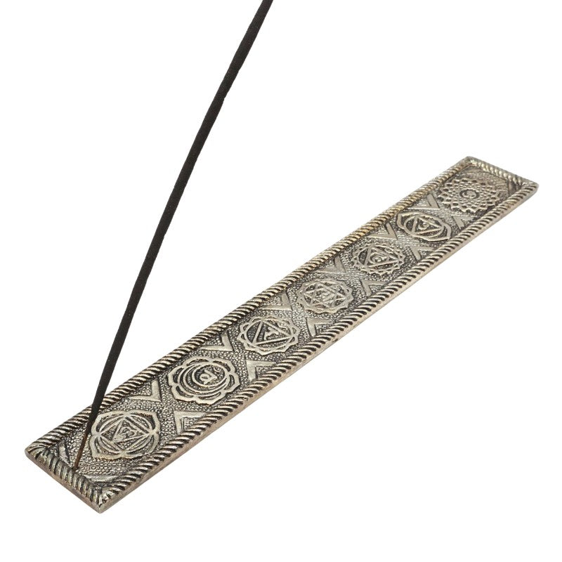 incense stick in an aluminium incense burner