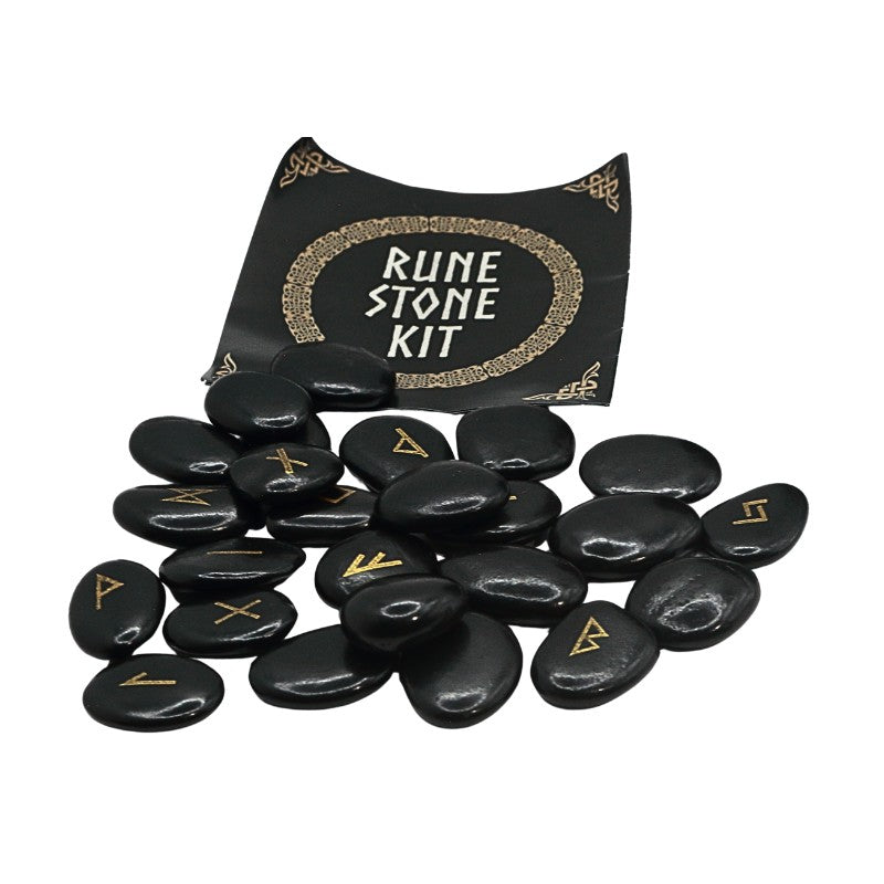 Rune stone kit with stones and bag on a white background