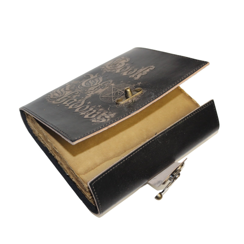 Leather bound book with gothic "book of shadows" written on the cover with a pentacle and brass coloured clasp with antiqued paper inside.