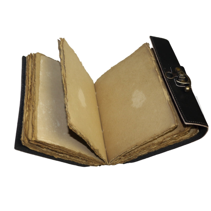 Leather bound book with gothic "book of shadows" written on the cover with a pentacle and brass coloured clasp with antiqued paper inside.