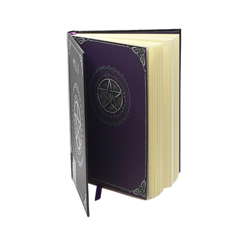 Purple notebook with star and circle design on a white background