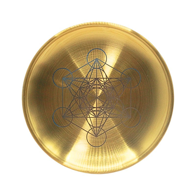 Gold coloured stainless steel plate with engraved Metatron's cube design