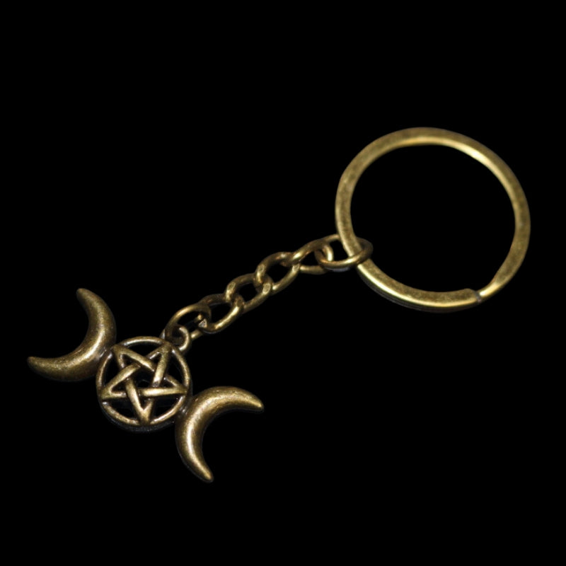 dark gold coloured key ring with a triple moon (a crescent moon on either side of a circle) with a pentagram inside the circle (5 pointed star within a circle) joined to a dark gold ring by a dark gold chain