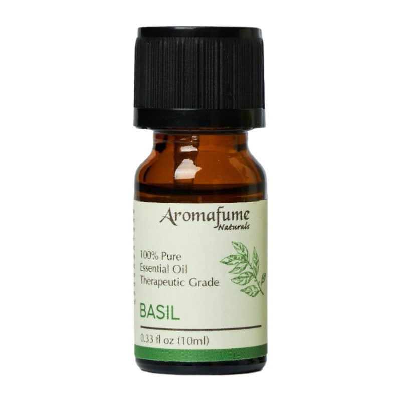 A 10ml amber glass bottle of Basil essential oil with a black ribbed cap and a cream-colored label featuring green text and a leaf illustration. The brand 'Aromafume Naturals' is clearly visible on the label.