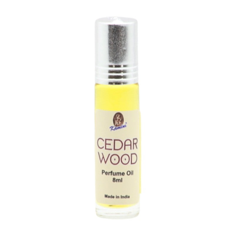 Bottle of cedarwood perfume oil in a glass bottle