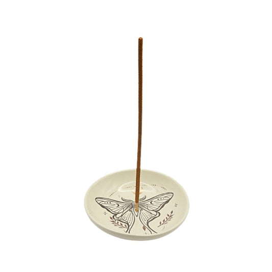Incense burner with a butterfly design on a white background