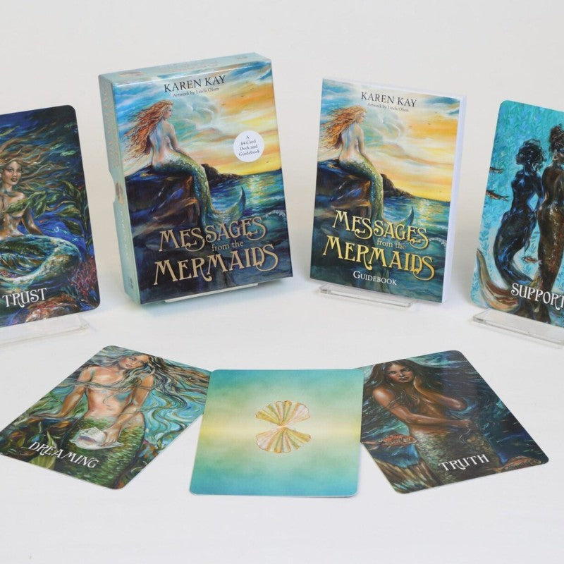 messages from the mermaids oracle deck- box, guidebook and 5 cards laid out
