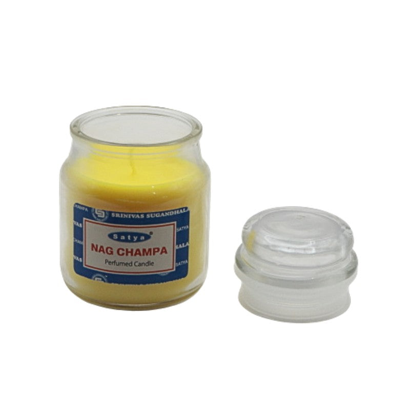 Nag Champa scented candle in a glass jar with a white background