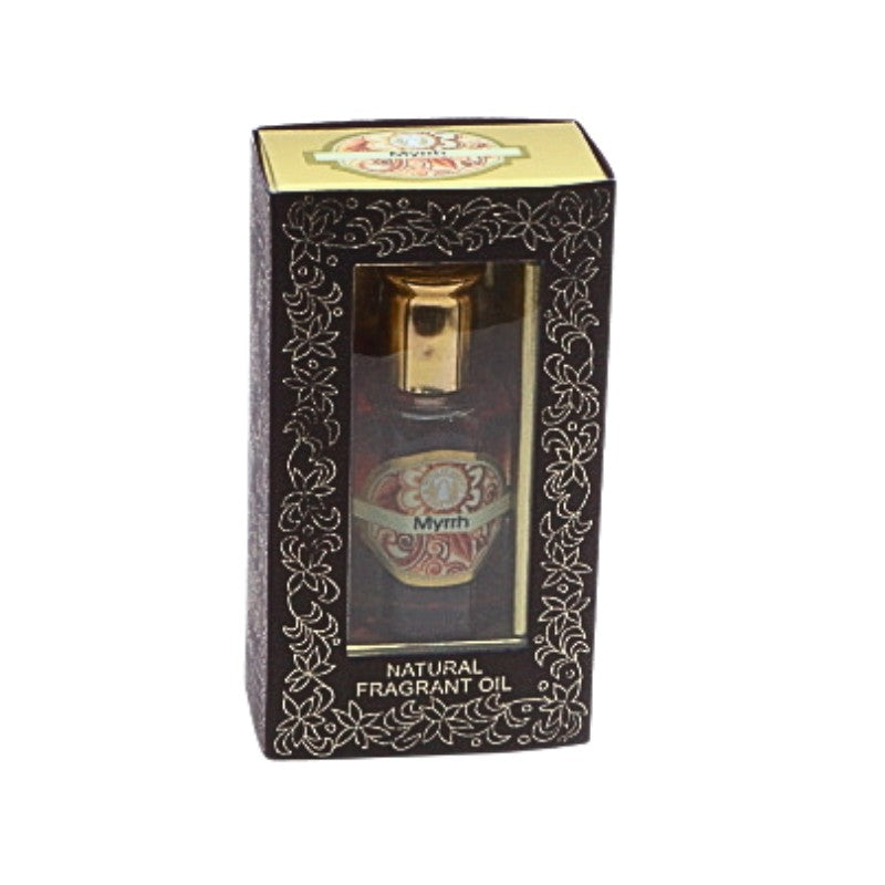 Fragrant oil bottle in decorative packaging on a white background