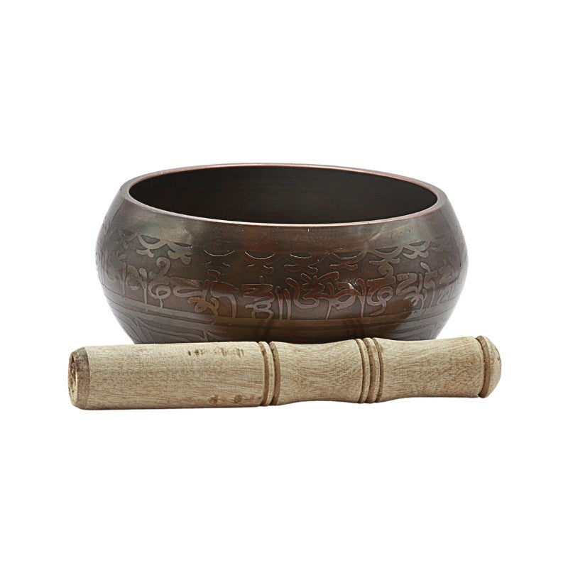 brass singing bowl with wooden striker