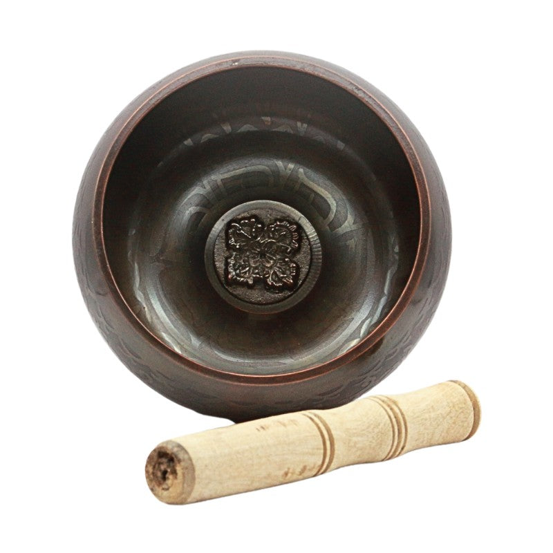brass singing bowl with wooden striker