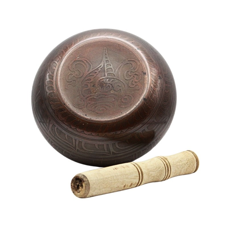 brass singing bowl with wooden striker