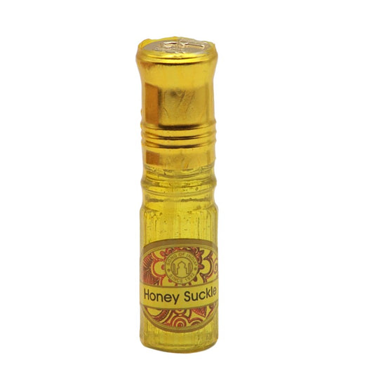 small perfume bottle with gold lid by Song Of India
