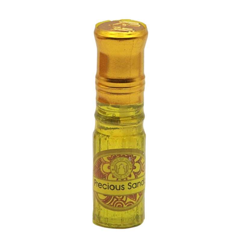 small perfume bottle with gold lid by Song Of India