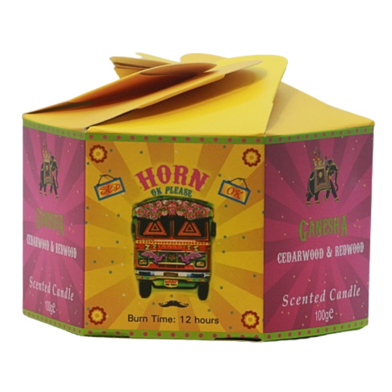 yellow and pink candle box with a colourful bus on the front