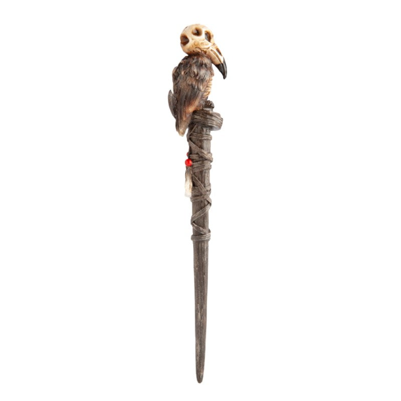 costume magic wand with a raven skull on top
