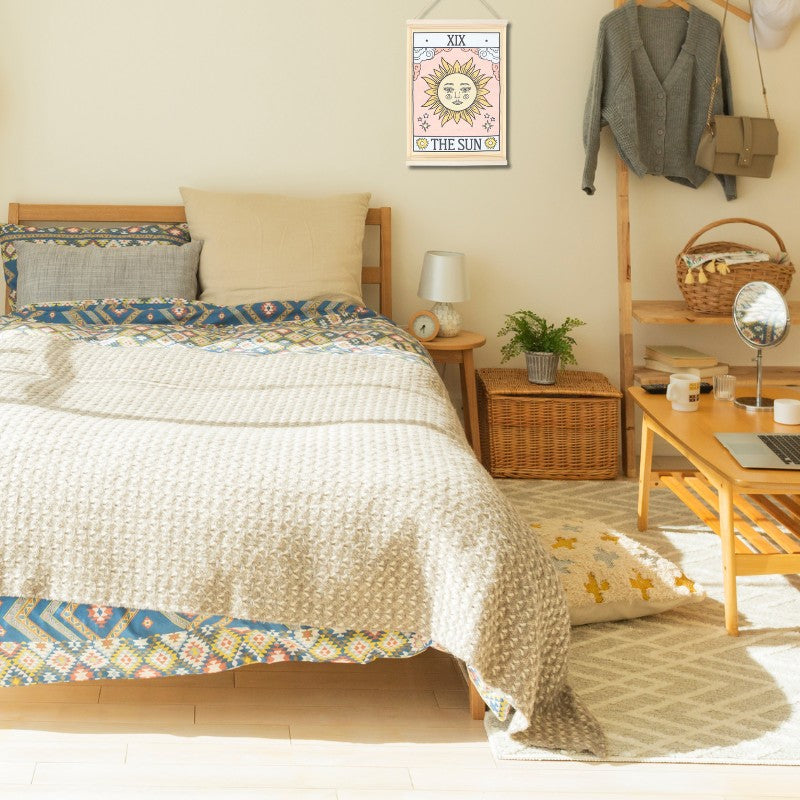 Vintage Tarot wall hanging showing "The Sun" Tarot Card on bedroom wall