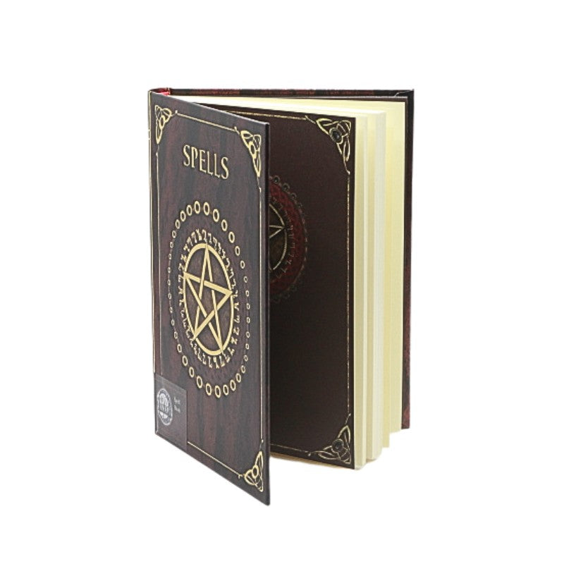Decorative notebook with 'Spells' text and pentacle symbol on a white background
