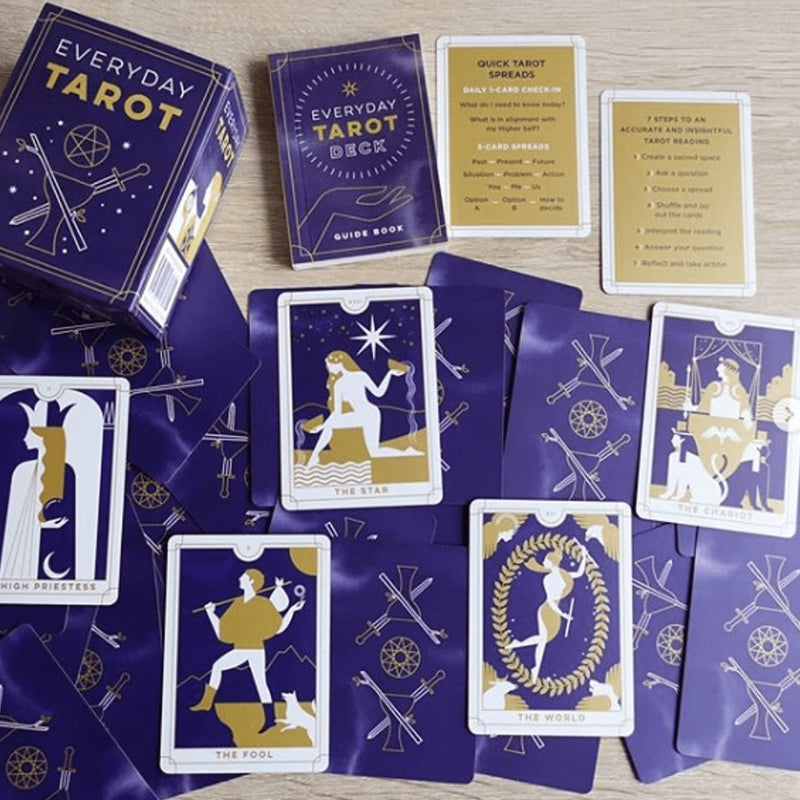 everyday tarot mini tarot deck cards spread out on table