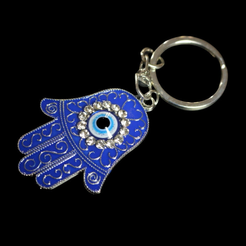hamsa hand keyring- blue hand with palm open with a blue and white round eye in the centre, surrounded by diamantes on a silver chain attached to a silver ring
