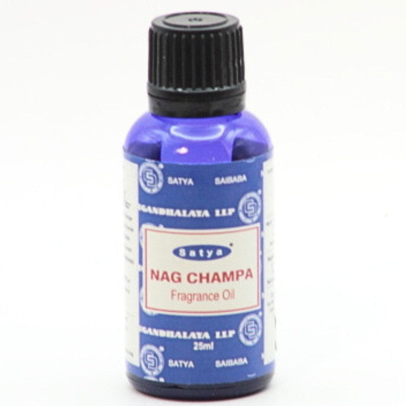 blue bottle of fragrance oil by Satya- Nag Champa