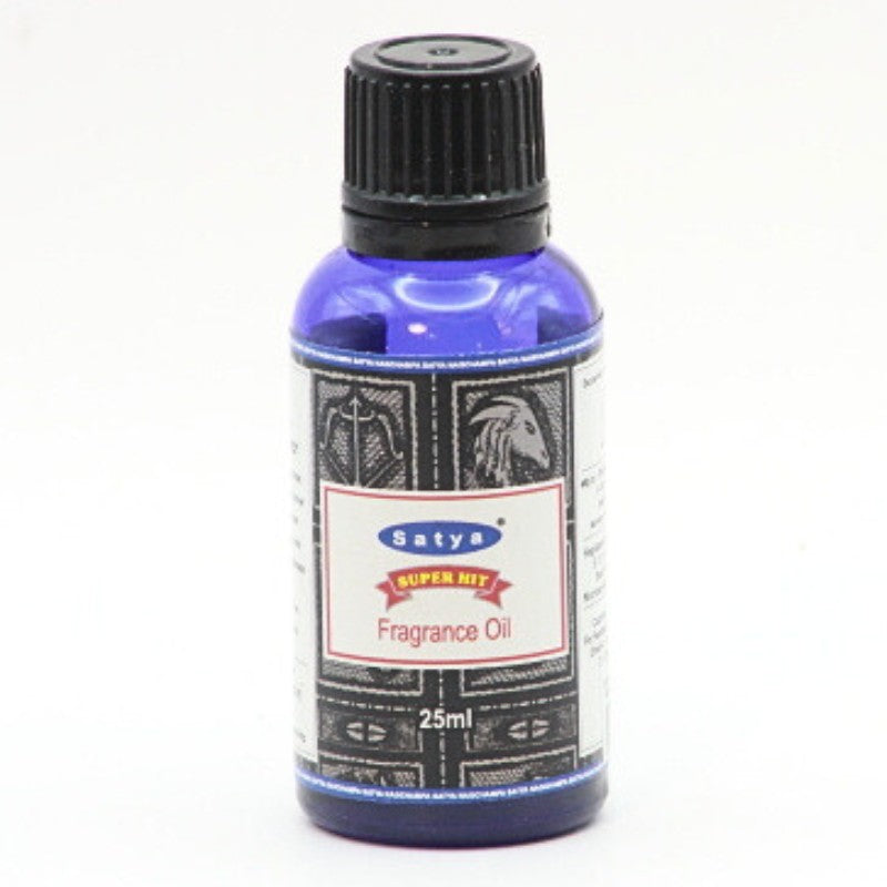 blue bottle of satya fragrance oil- superhit