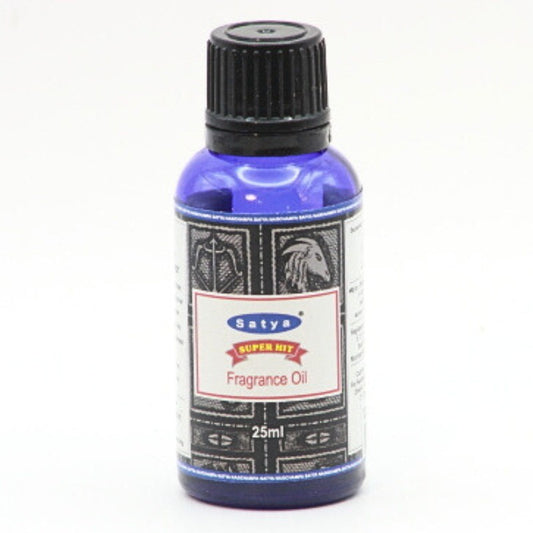 blue bottle of satya fragrance oil- superhit