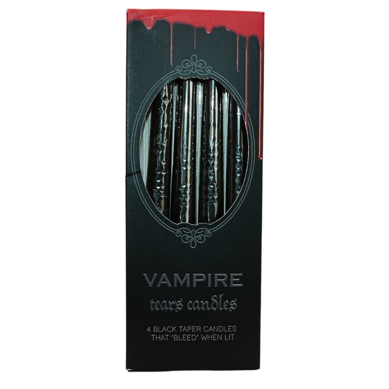 pack of 4 black taper candles that "bleed" when lit