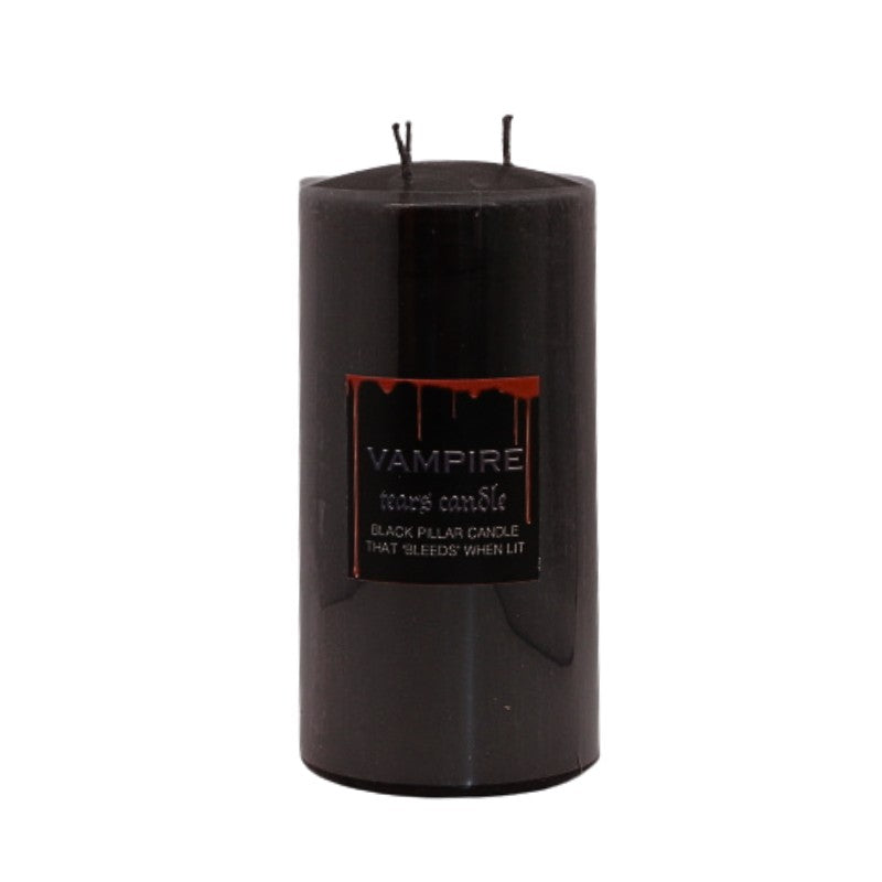 black pillar candle that bleeds red wax when lit