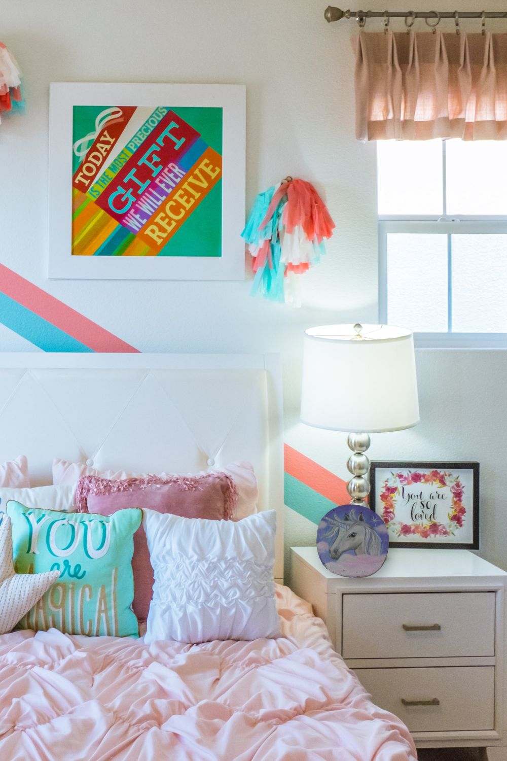 handpainted unicorn wood round in childs bedroom