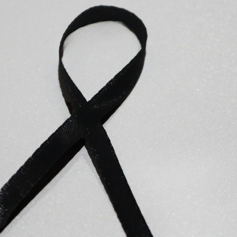 Black ribbon on white background