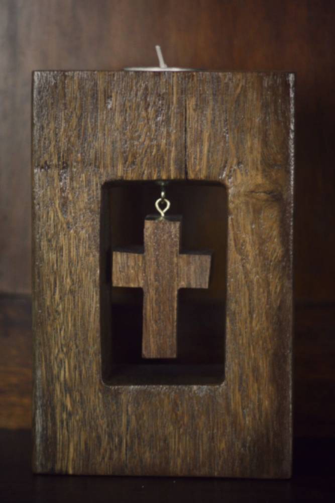 cross wooden tealight candle holder  solid hardwood with white tea light in top on wooden background