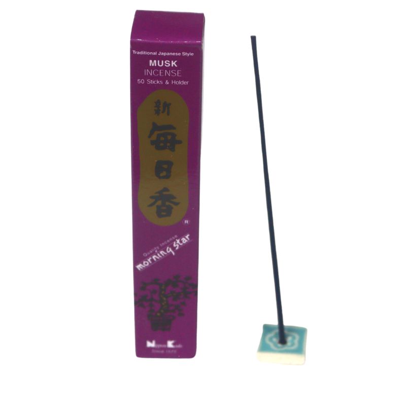 rectangle box of japanese morning star "Musk" incense sticks next to a tile incense holder