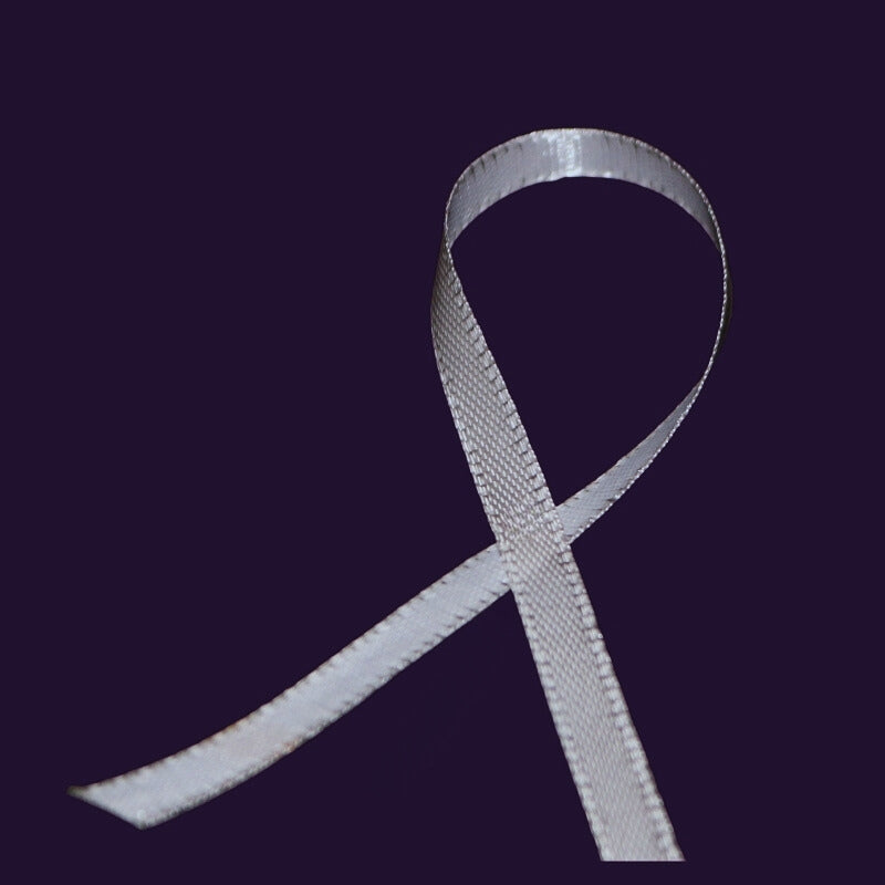 Silver ribbon on purple background