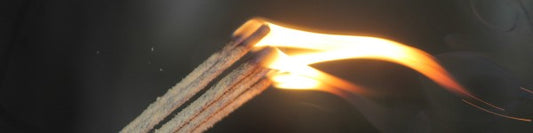 lit incense sticks