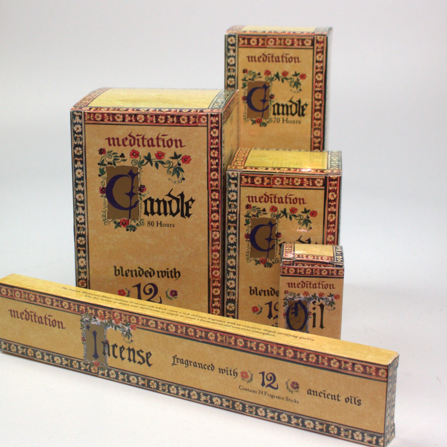 Meditation range fragrance candles, 3 different sizes with 1 x 15ml meditation fragrance oil on a white table with grey background