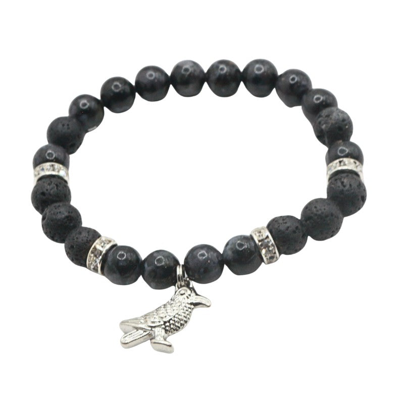 Black beaded crystal bracelet with a silver charm on a white background
