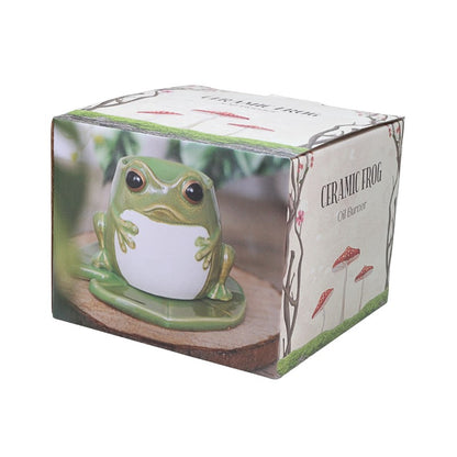 box featuring a ceramic frog oil burner on a lily pad