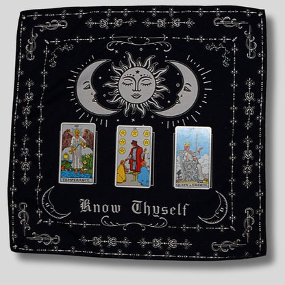 3 card spread laid out on a black and white tarot cloth