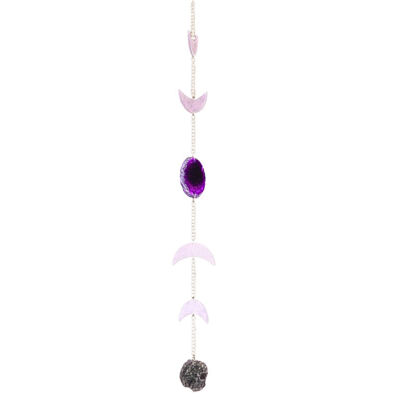 wall hanging  with purple gemstone and moon phase pendants on a white background