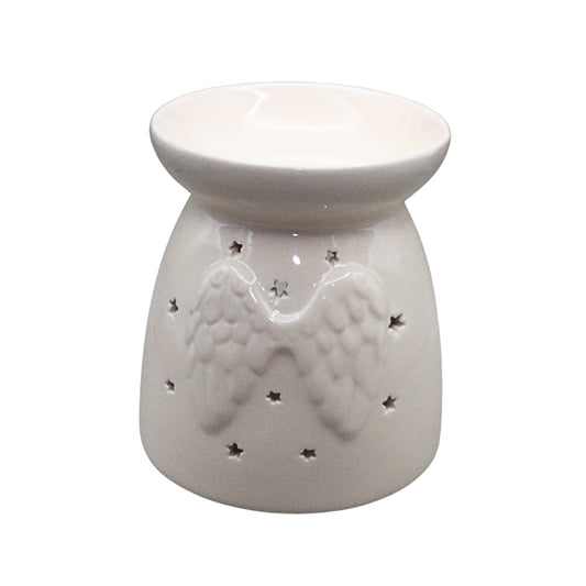 A white ceramic oil burner with a relief of angel wings and small star cutouts, shown on a plain white background.