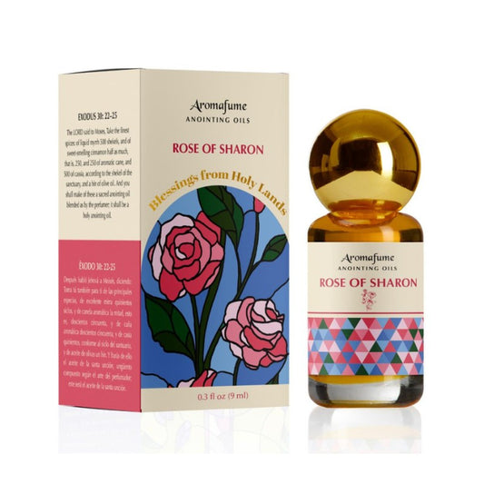 Bottle of anointing oil with colourful label next to packaging box