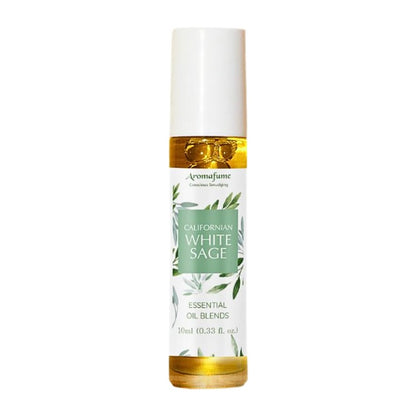 glass bottle containing oil with a white and green floral  label