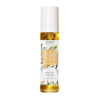 glass bottle containing oil with a white and green floral  label
